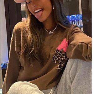 Brown pink cross crewneck